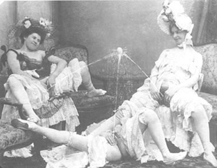 three ladies balancing a ball with their pee